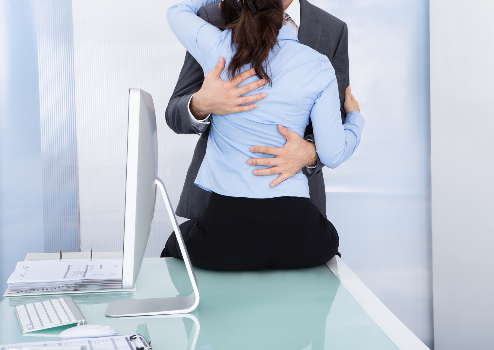Businessman And Businesswoman Making Love